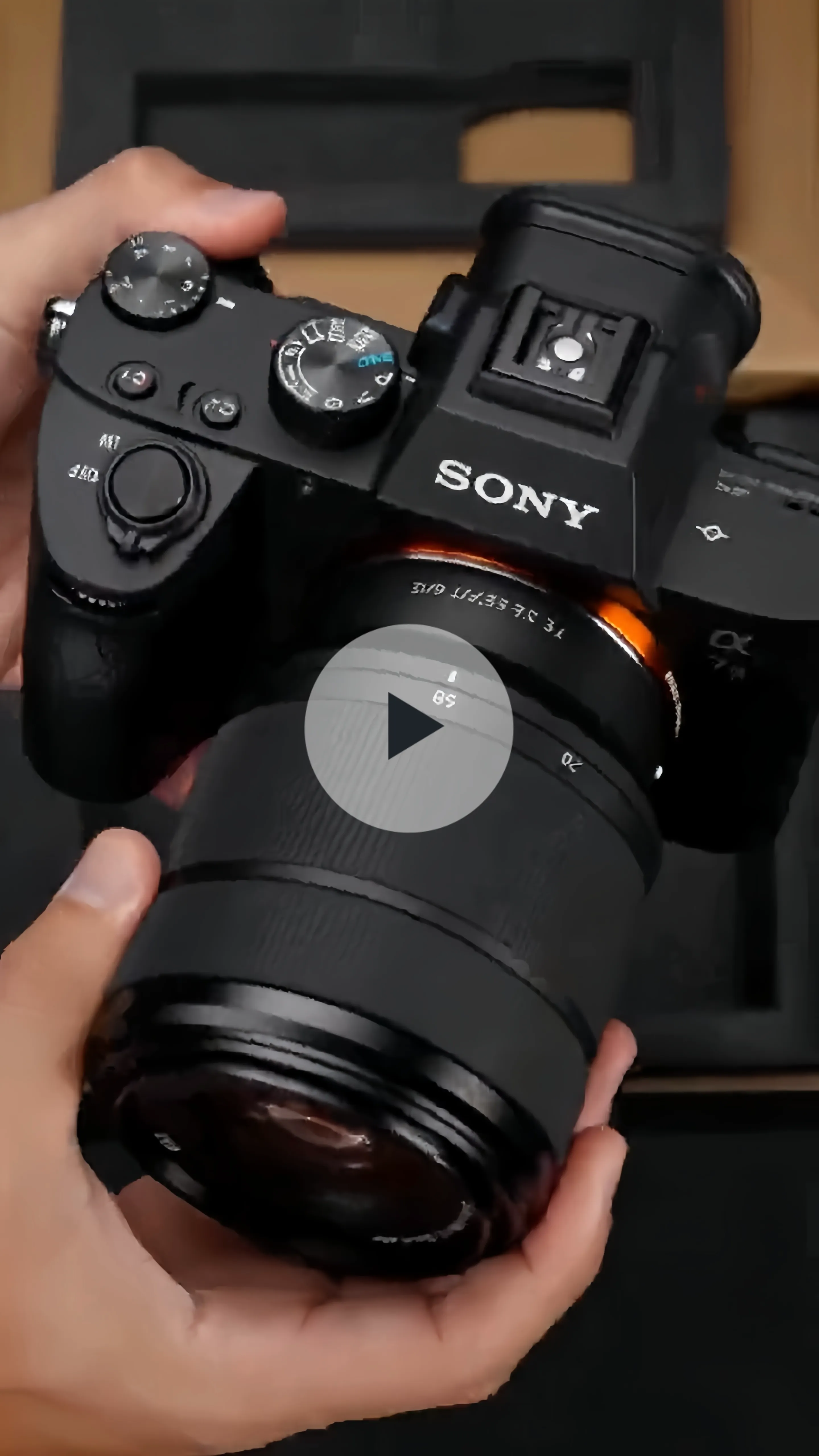 High tech studio animation video ad with 360 degree rotation of a DSLR camera under studio rim lighting