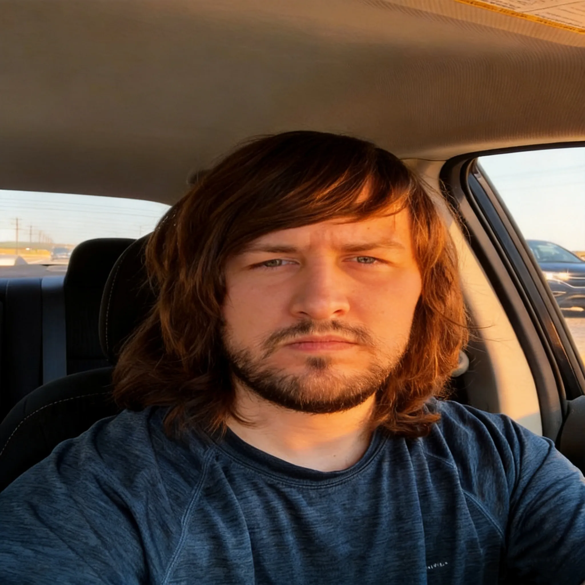 Make this face very well lit so it's more attractive. 
Make the lighting cozy and warm but also well lit up. Make it look like a fantastic profile picture. Make it perfect.