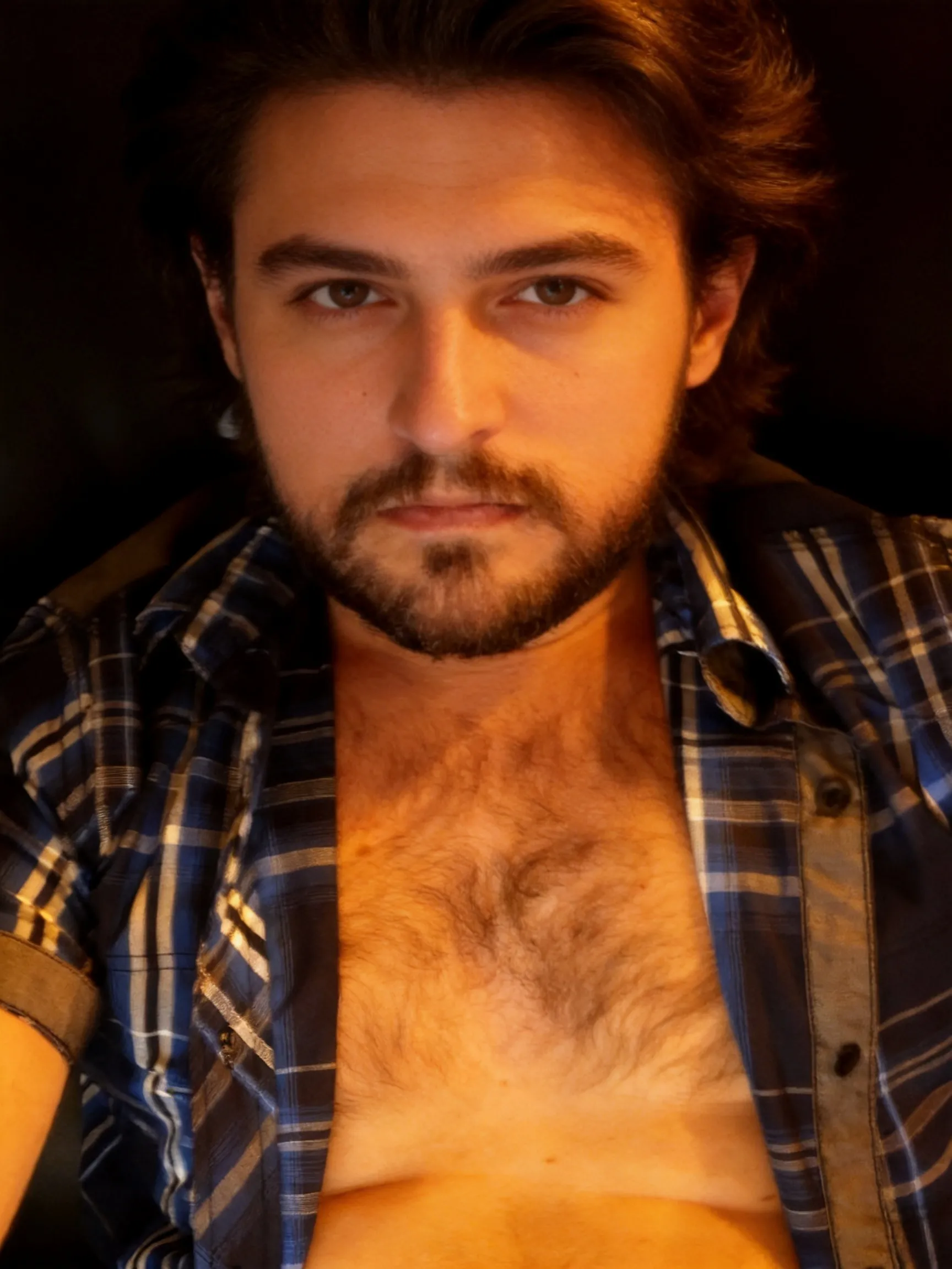 Make this the best profile picture ever. Make the lighting warm and cozy but not too extremely warm. Make the lighting perfect. You can crop the image if necessary.