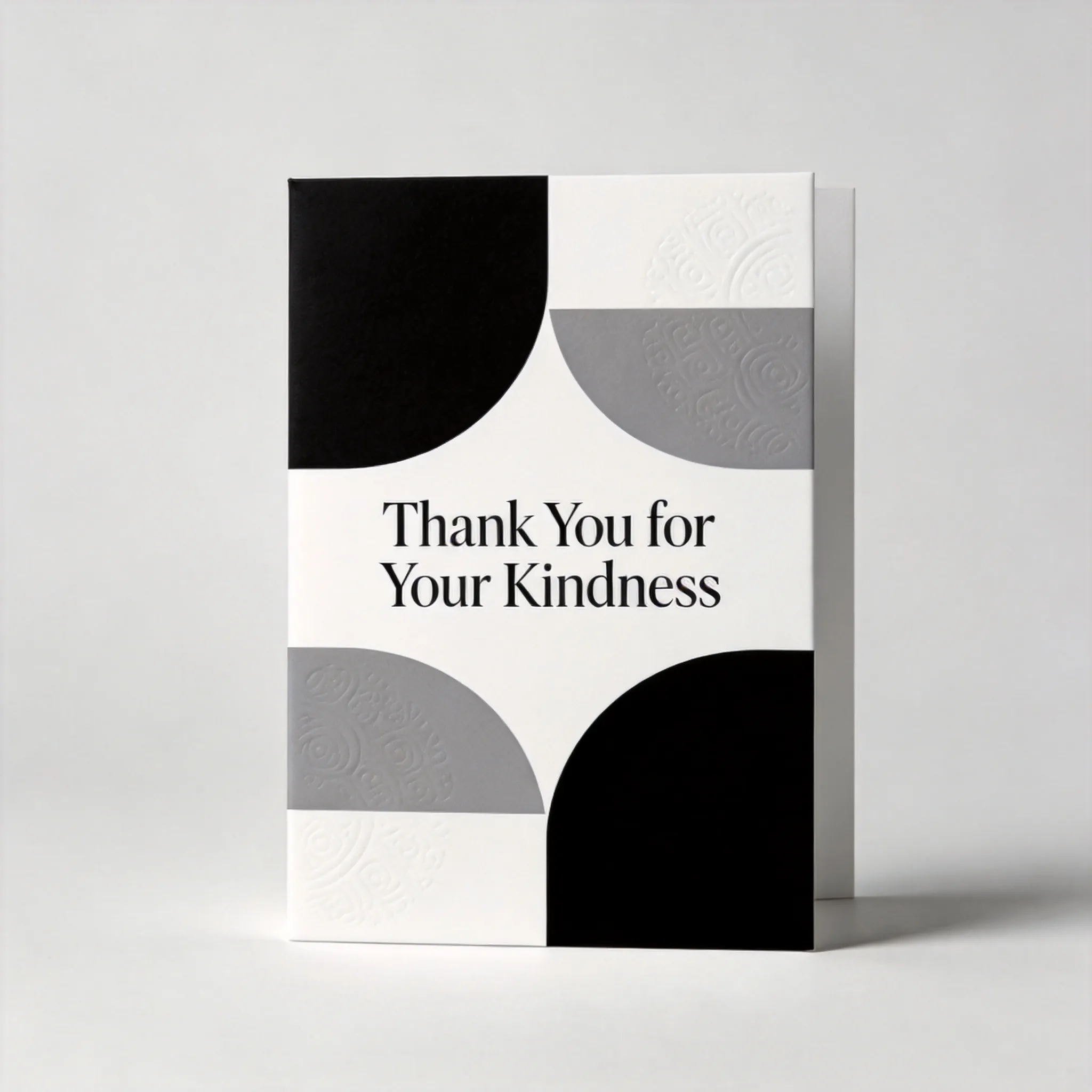 A sleek and minimalist thank you card design, modern geometric shapes arranged in a balanced composition, monochrome black, white, and gray color palette, elegant negative space, luxury stationery aesthetic, clean typography prominently displaying "Thank You for Your Kindness", contemporary graphic design, premium paper texture, sophisticated layout, Scandinavian design influence, professional greeting card design, print-ready, high-end branding style
