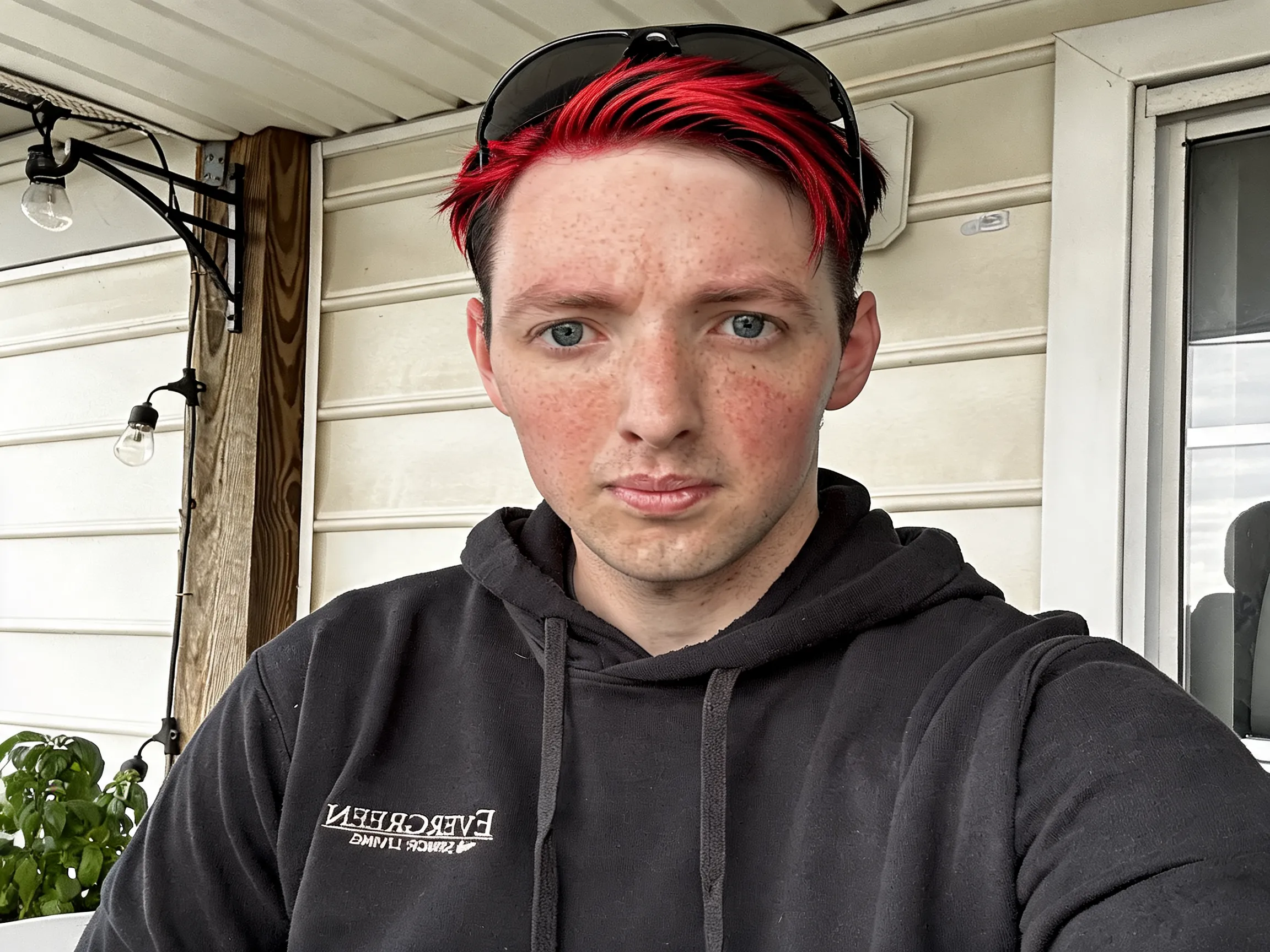 Change my hair color to red and black highlighted style.