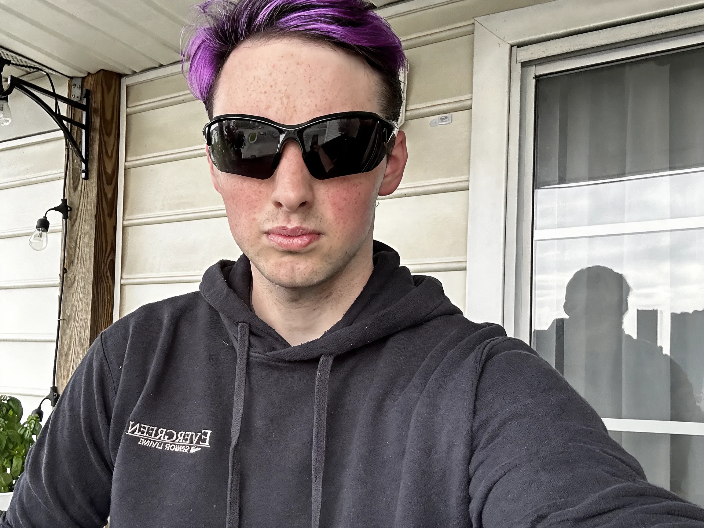 Change my hair color to purple and black highlighted style.