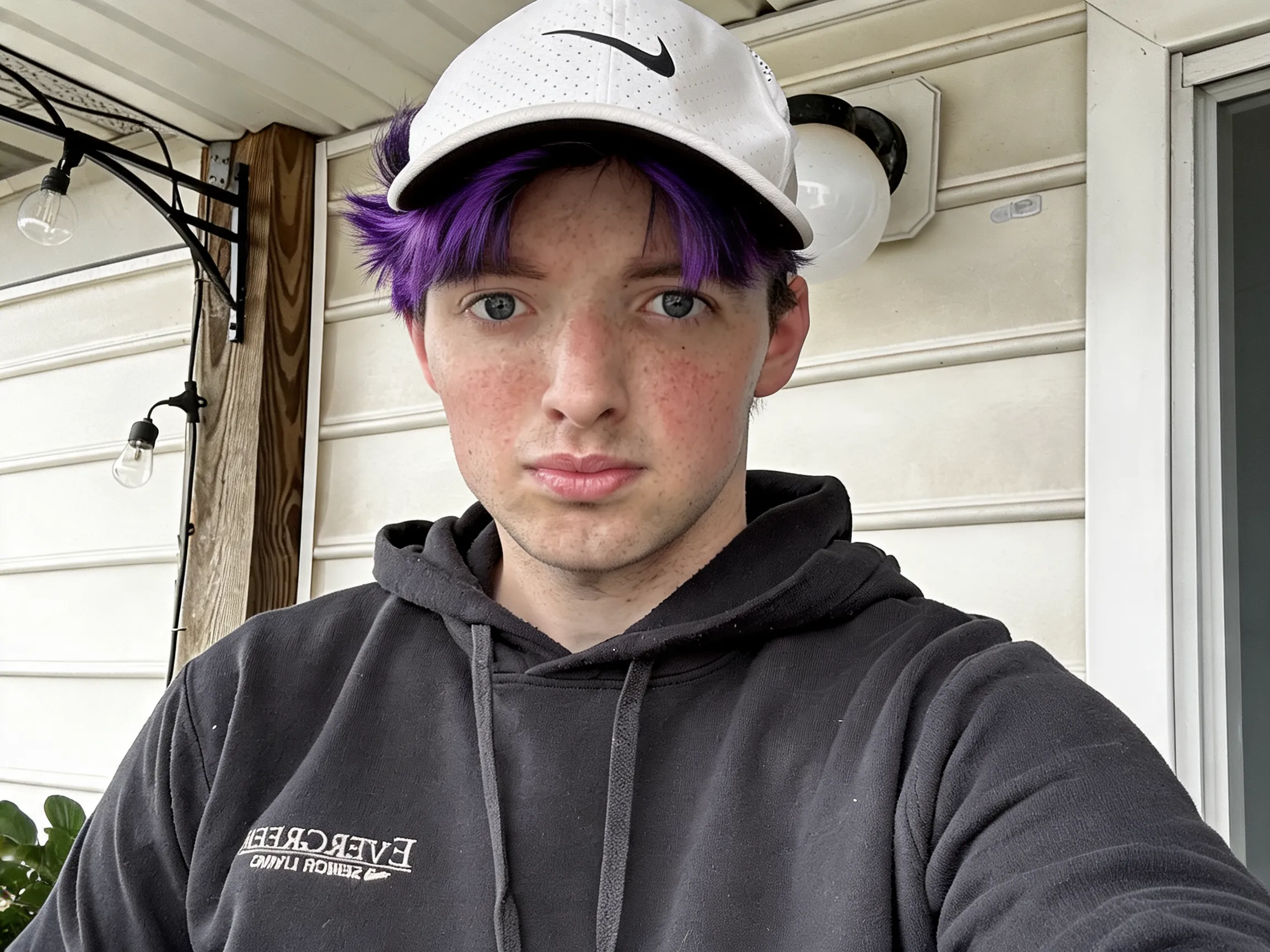 Change my hair color to purple and black highlighted style.