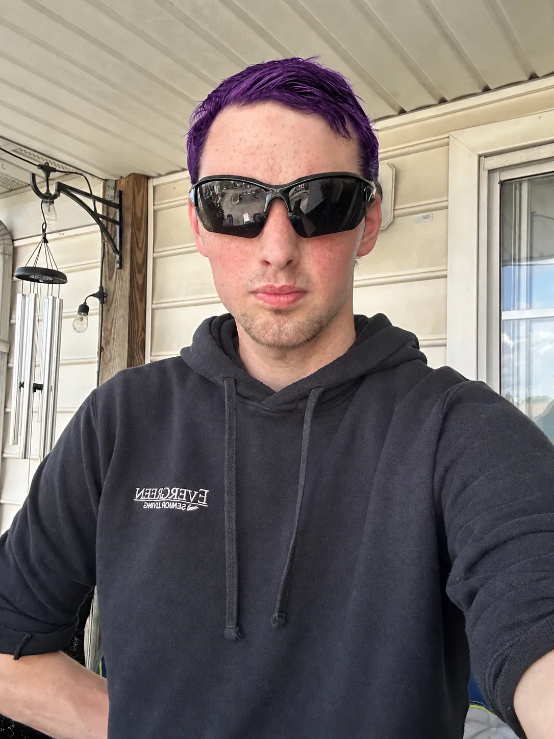 Change my hair color to purple and black highlighted style.