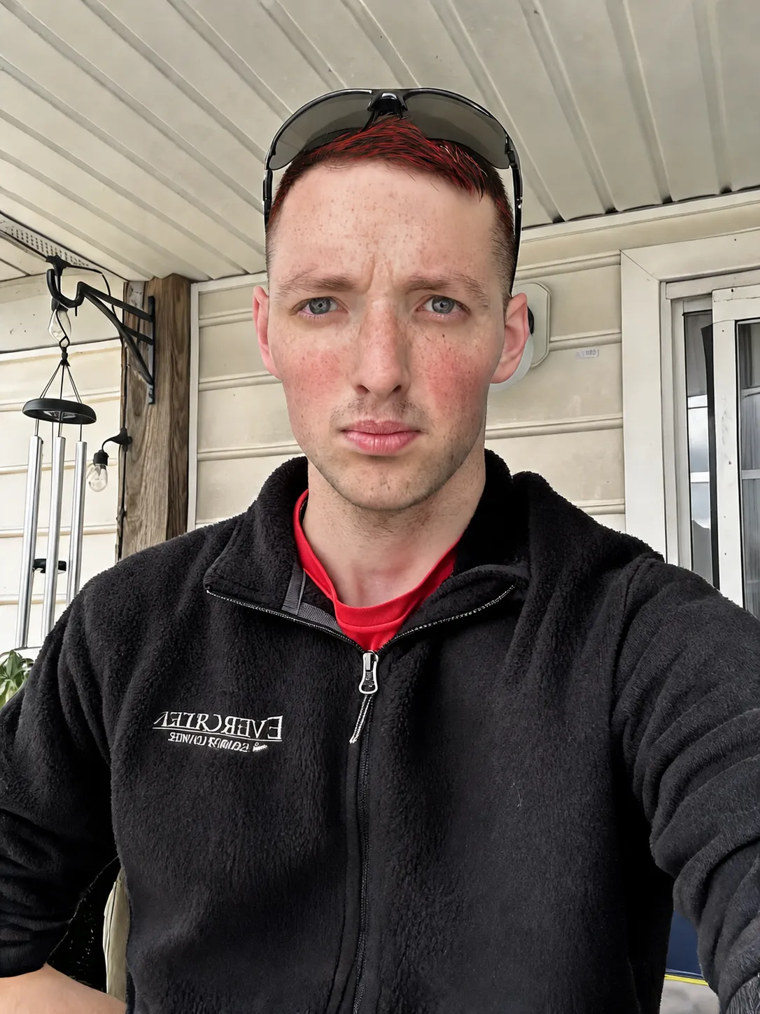 Change my hair color to red and black highlighted style.
