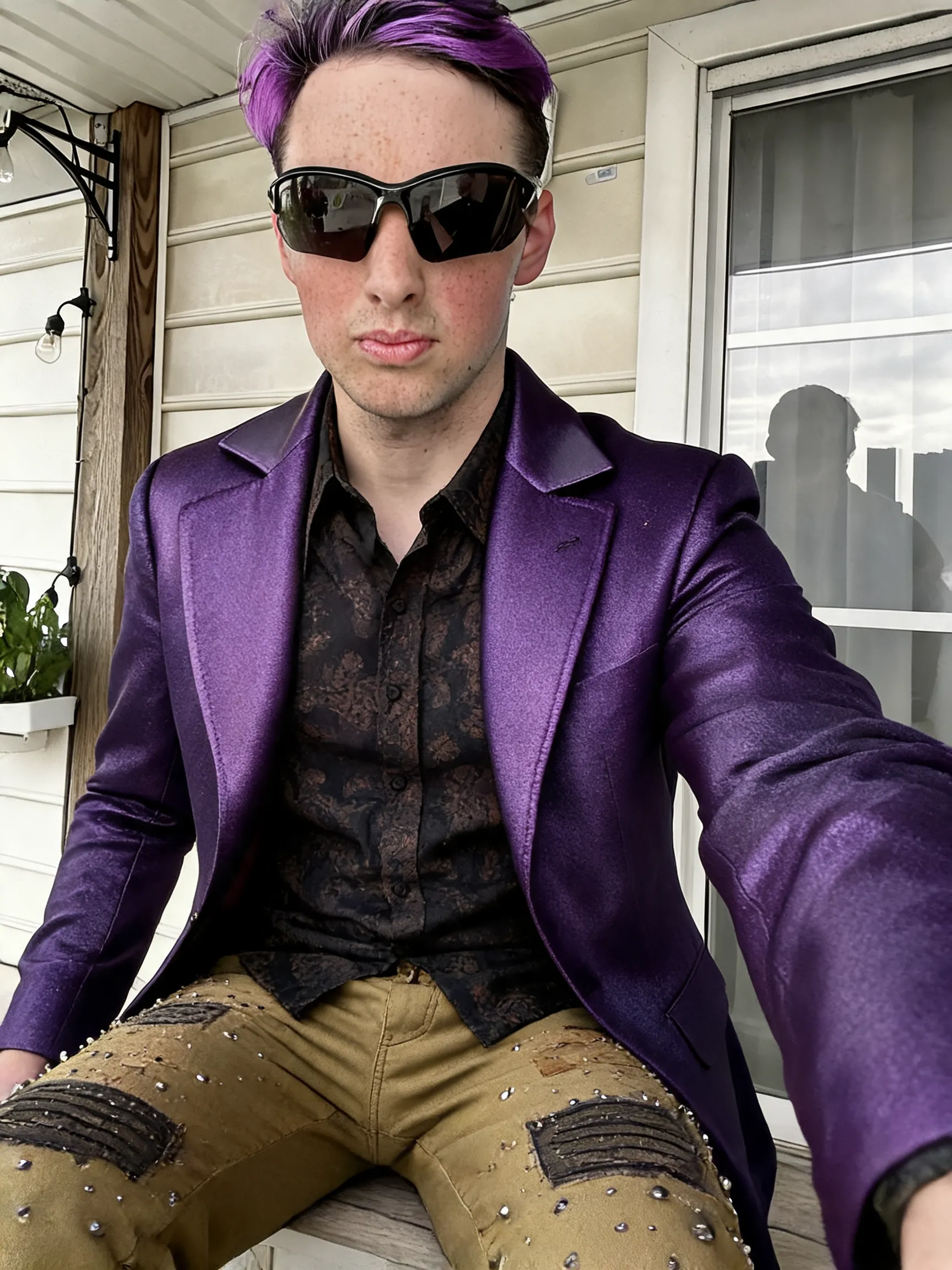 Try this clothing item on the person in the photo.
