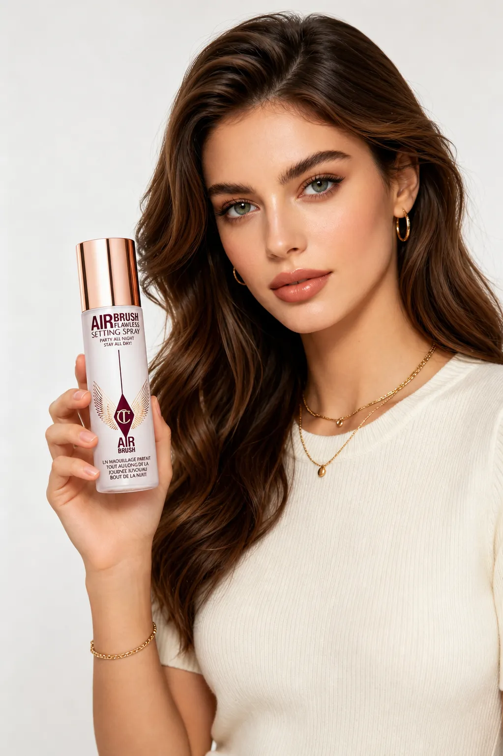 Create an e-commerce lifestyle product photo using the uploaded portrait and uploaded product image. Product placement style: Holding View