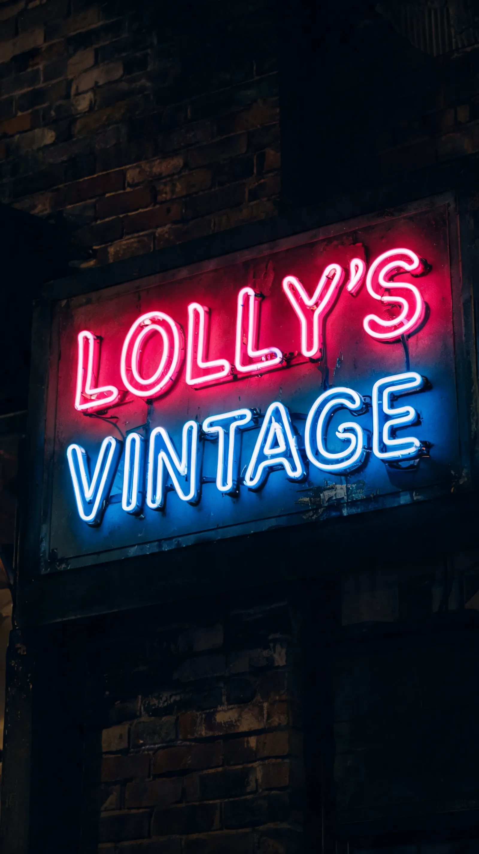 Bent neon tubing letters for vintage store signage