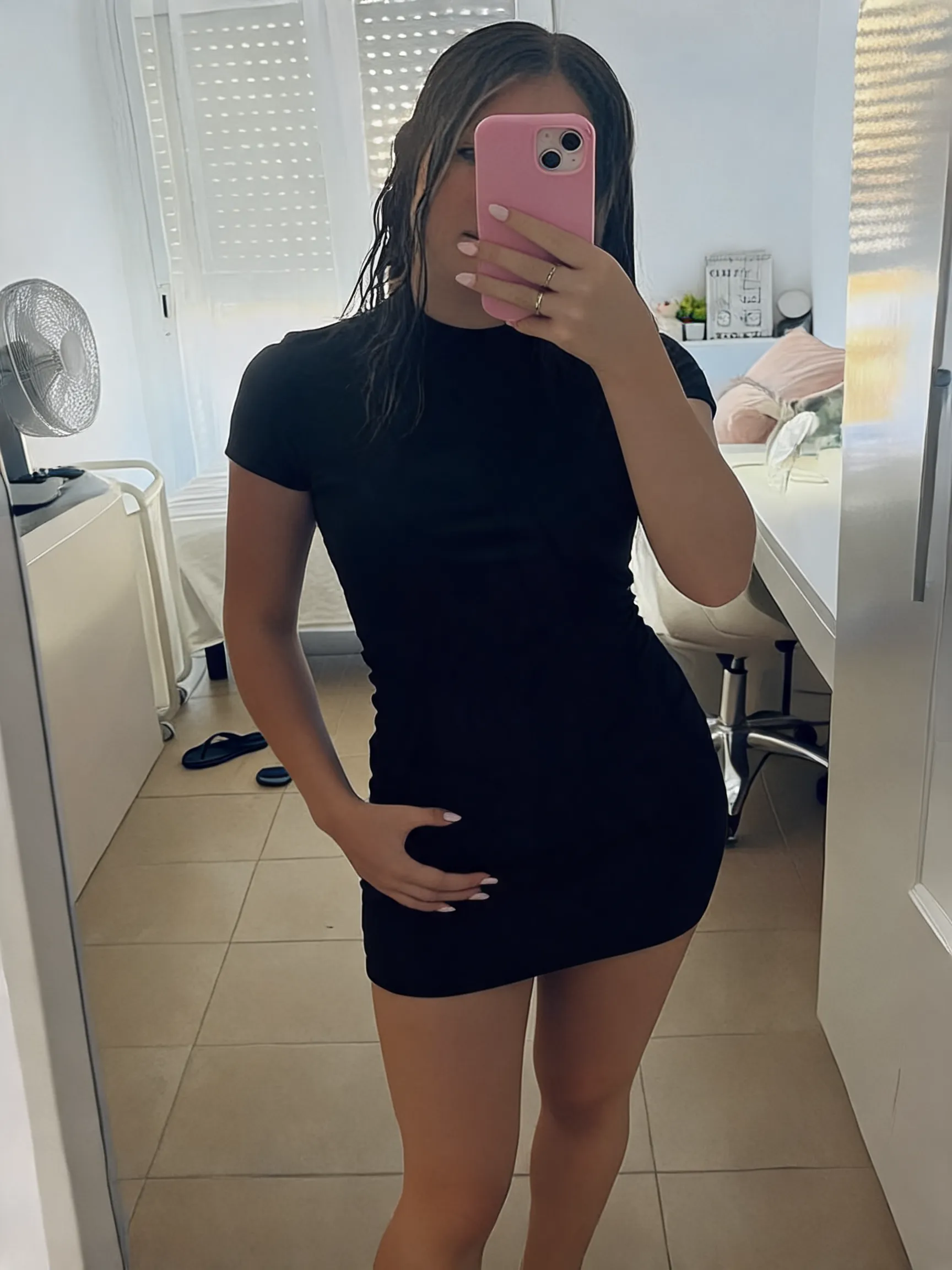 Try this clothing item on the person in the photo.