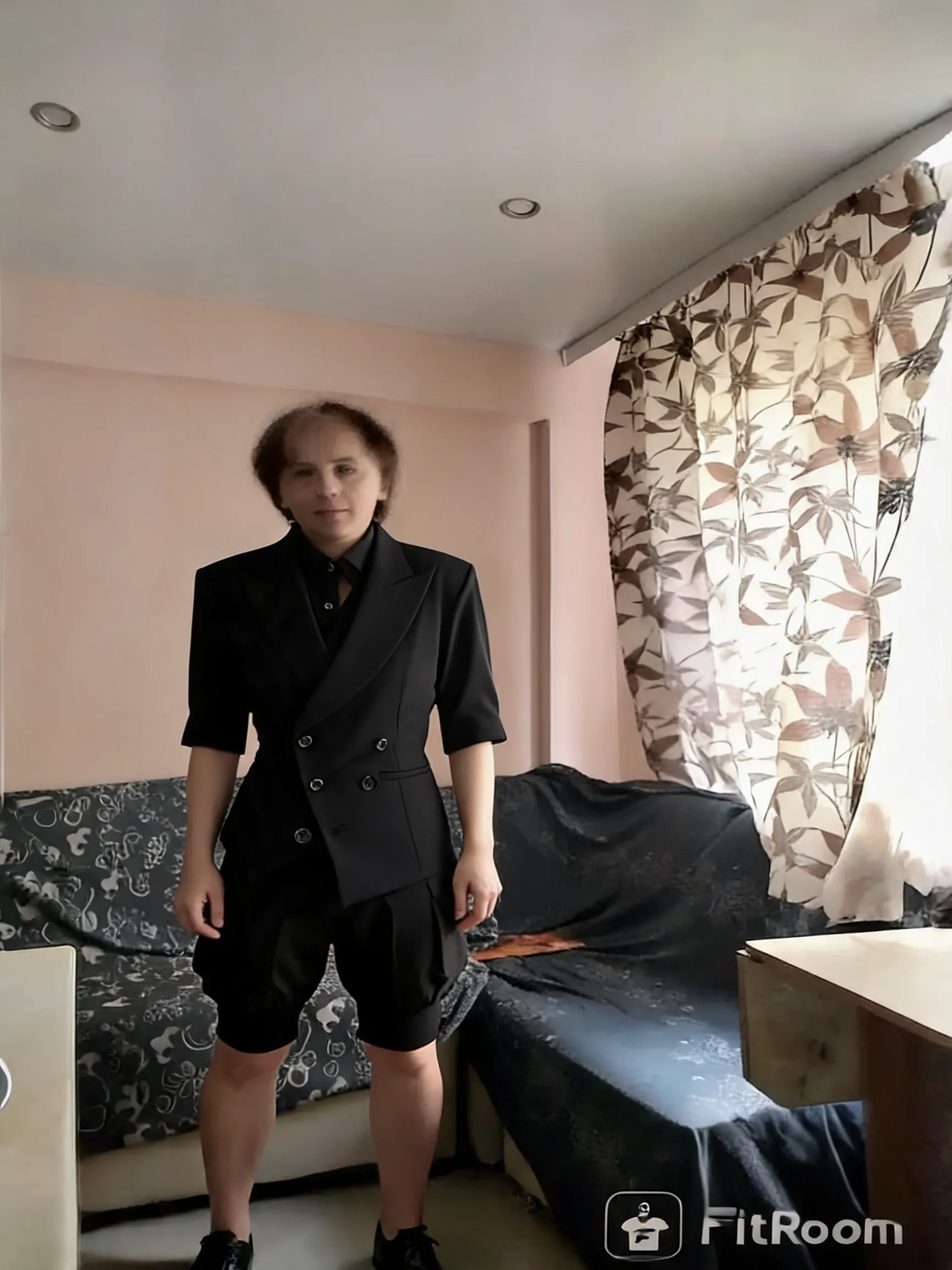 Try this clothing item on the person in the photo.