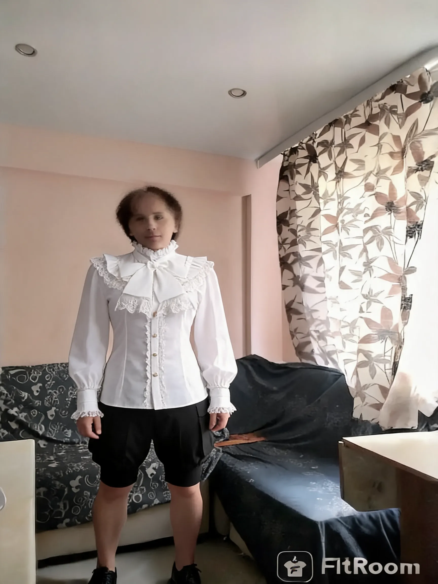 Try this clothing item on the person in the photo.